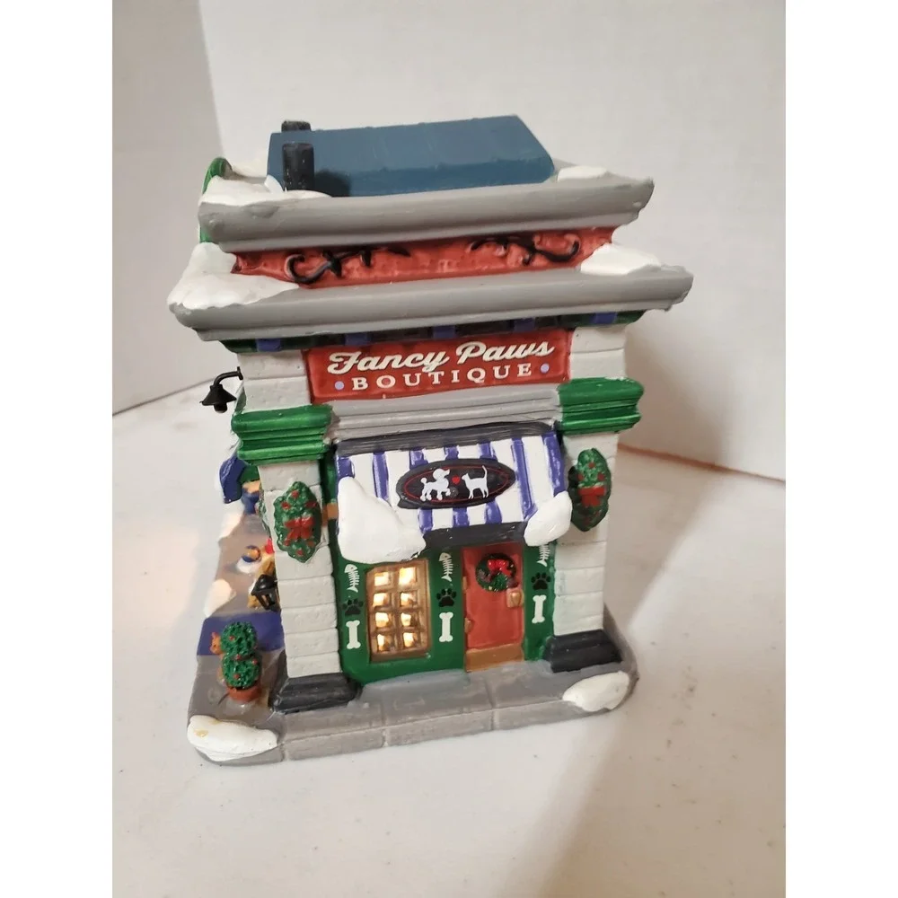 Lemax Fancy Paws Boutique, a lighted porcelain building from the Caddington...